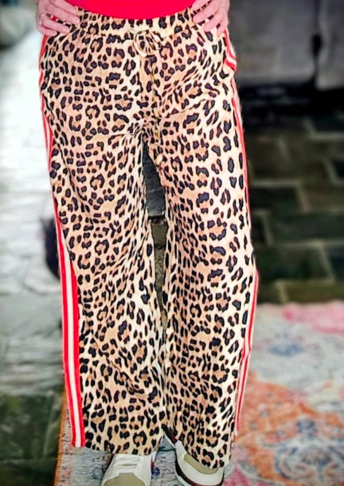 The Fierce & Free Pants | Leopard Print Wide Leg pants with Red Stripe.